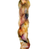 Skein of superkid mohair silk lace weight yarn color pink blue brown