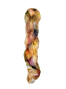 Skein of superkid mohair silk lace weight yarn color pink blue brown