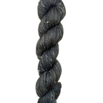Skein of hand dyed BFL Tweed Yarn color steel grey 