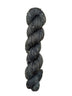 Skein of hand dyed BFL Tweed Yarn color steel grey 