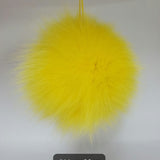 Fur Pompoms Small by Schildkraut color yellow