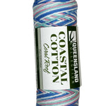 pink teal blue white skein of yarn 