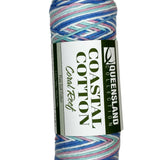 pink teal blue white skein of yarn 