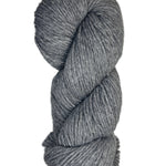 A skein of Berroco Vintage Wool Yarn in the color smoke grey