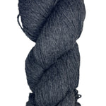 A skein of Berroco Vintage Wool Yarn in the color heathered dark grey