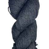 A skein of Berroco Vintage Wool Yarn in the color heathered dark grey
