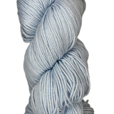 A skein of Berroco Vintage Worsted yarn color misty blue