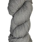 A skein of Berroco Vintage Wool Yarn in the color light dove grey