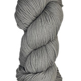 A skein of Berroco Vintage Wool Yarn in the color light dove grey