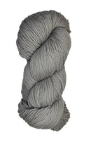 A skein of Berroco Vintage Wool Yarn in the color light dove grey