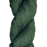 A skein of Berroco Vintage Wool Yarn in the color heathered dark forest green with light green flecks