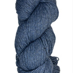 A skein of Berroco Vintage Wool Yarn in the color heathered navy blue