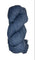 A skein of Berroco Vintage Wool Yarn in the color heathered navy blue