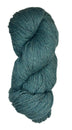 A skein of Berroco Vintage Wool Yarn in the color heathered teal with green