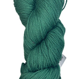 A skein of Berroco Vintage Worsted yarn color mistletoe green