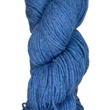 A skein of Berroco Vintage Worsted yarn color sapphire blue