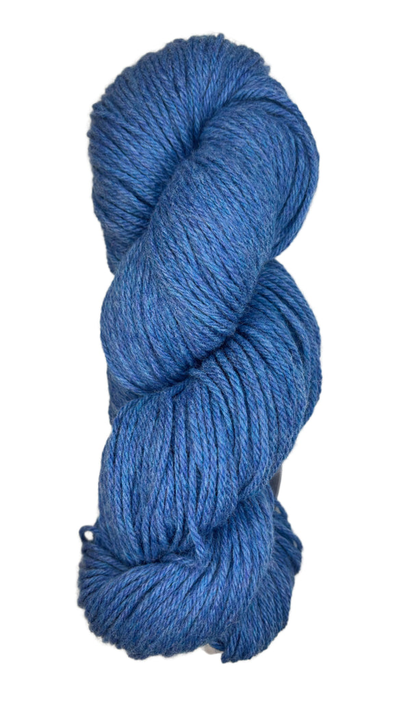 A skein of Berroco Vintage Worsted yarn color sapphire blue