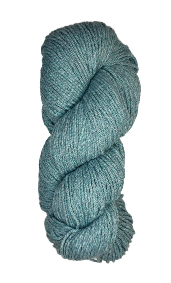 A skein of Berroco Vintage Wool Yarn in the color light heathered eggshell blue