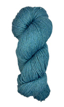 A skein of Berroco Vintage Worsted yarn color breezeway blue