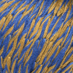 ball of berroco bestie yarn color blue and gold