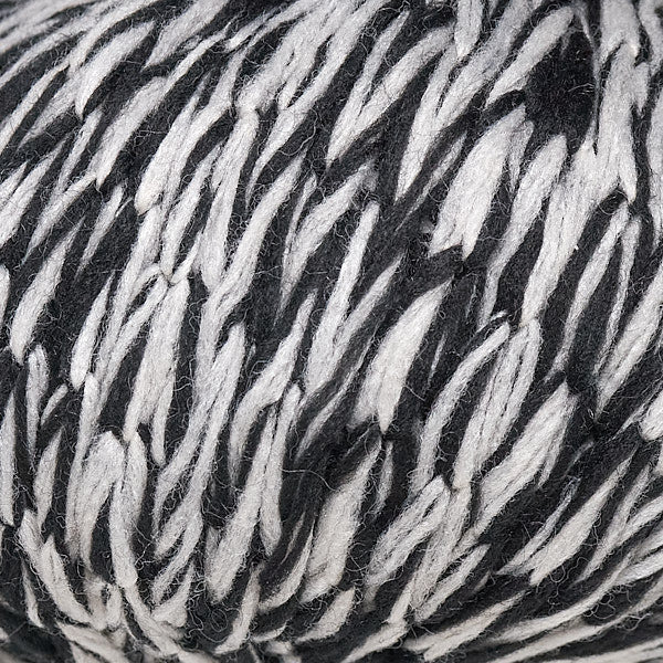 ball of berroco bestie yarn color black and white