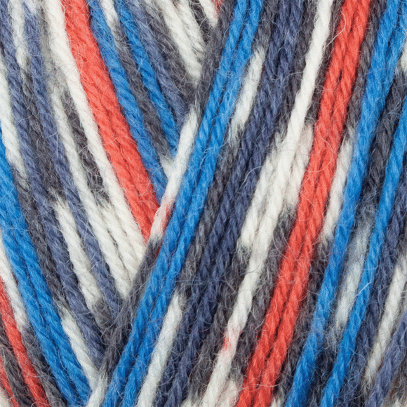 Close up of self striping yarn color red white blue black