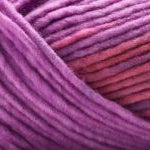 Detailed image of Universal Yarn Maman Acrylic Yarn in the colors  purple red