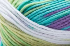 Detailed image of Universal Yarn Maman Acrylic Yarn in the colors teal white green purple