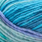 Detailed image of Universal Yarn Maman Acrylic Yarn in the colors blue purple light green teal