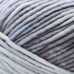 Detailed image of Universal Yarn Maman Acrylic Yarn in the colors white grey black