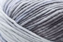 Detailed image of Universal Yarn Maman Acrylic Yarn in the colors white grey black