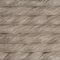 A close-up texture shot of thick, twisted cotton cord or rope in a warm off-white or cream color, stacked horizontally.