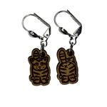 Wooden stitch markers with engraved detail of a cat facing front and back