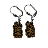 Wooden stitch markers with engraved detail of a cat facing front and back