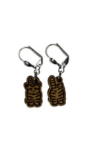 Wooden stitch markers with engraved detail of a cat facing front and back