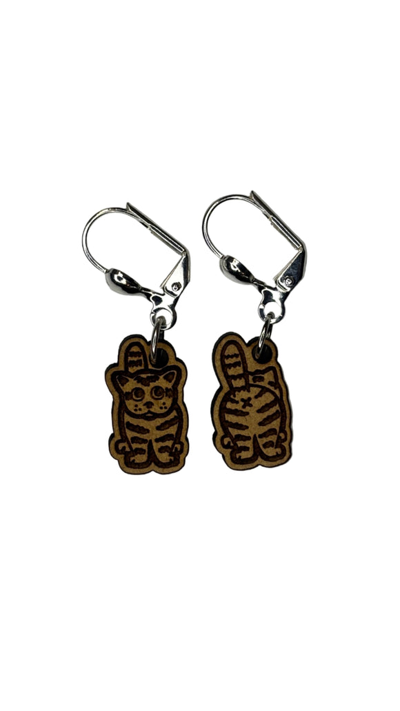 Wooden stitch markers with engraved detail of a cat facing front and back