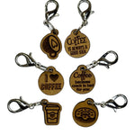 Wooden stitch markers with engraved detail of coffee related things