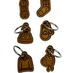 Wooden stitch markers with engraved detail of a sock, hat, mitten, yarn and a sweater