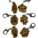 Wooden stitch markers with engraved detail of mushrooms