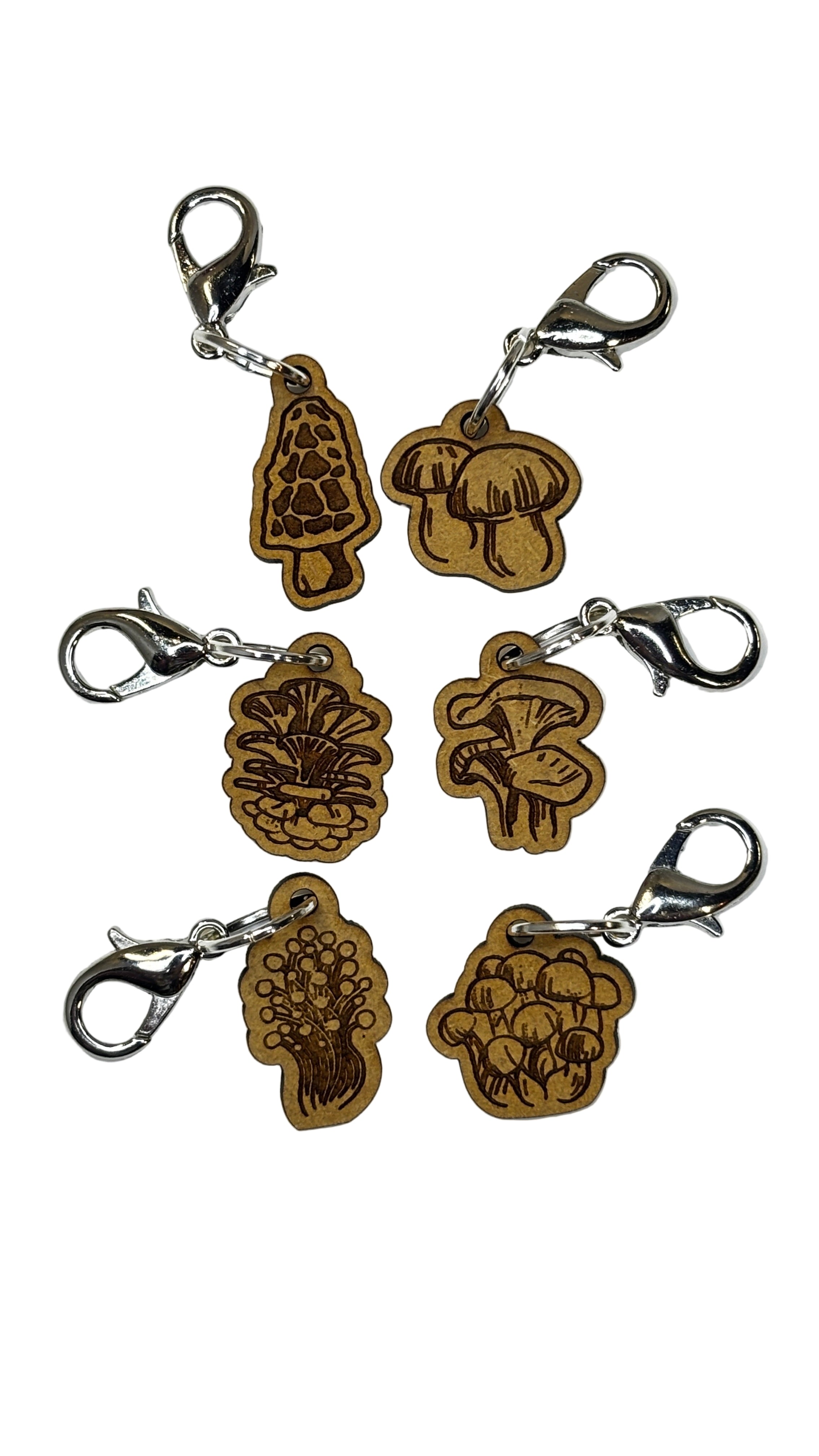 Wooden stitch markers with engraved detail of mushrooms