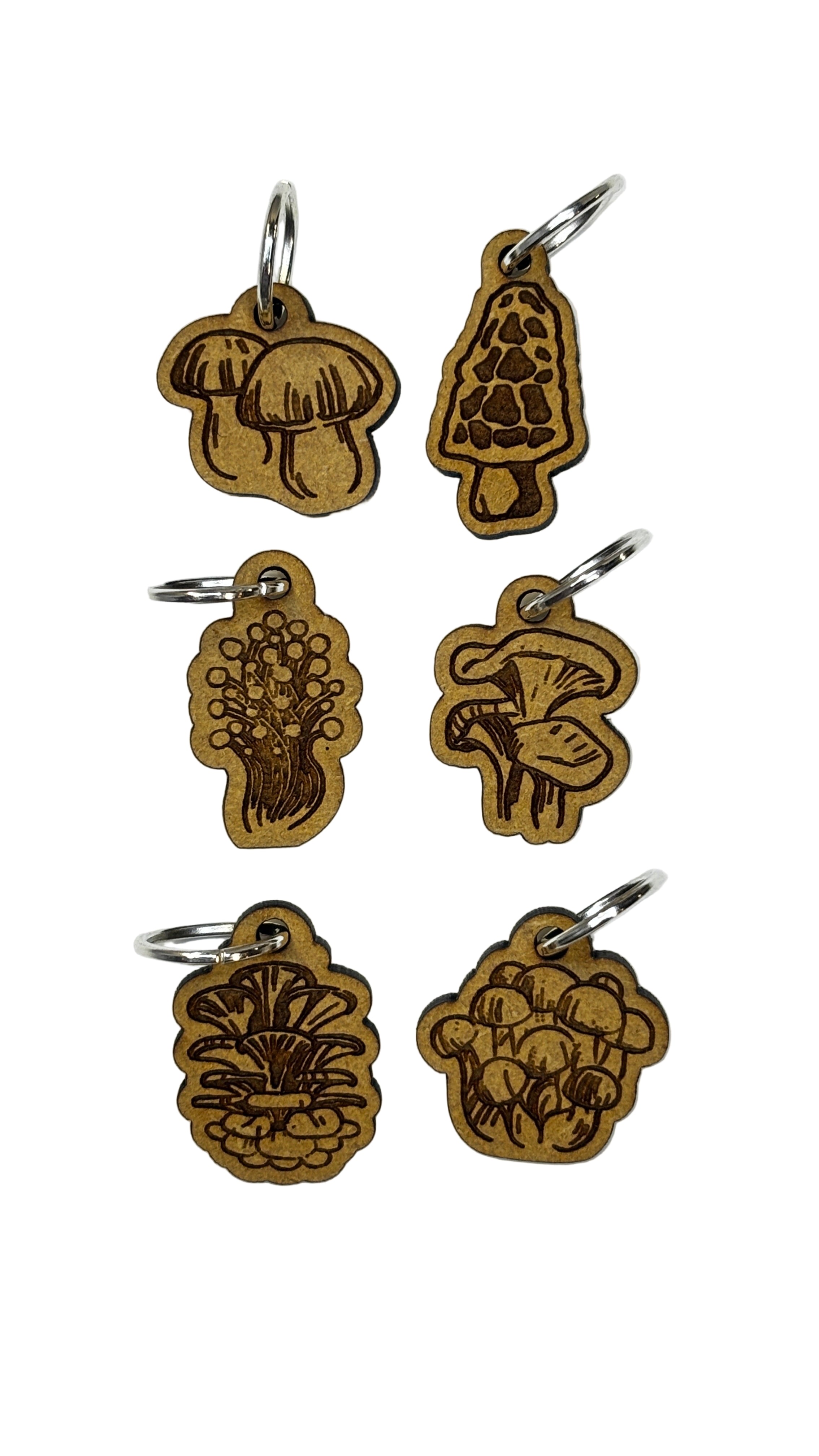 Wooden stitch markers with engraved detail of mushrooms