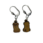 Wooden stitch markers with engraved detail of a pug facing front and back