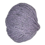 Ball of Kathmandu wool yarn in the color dusty purple
