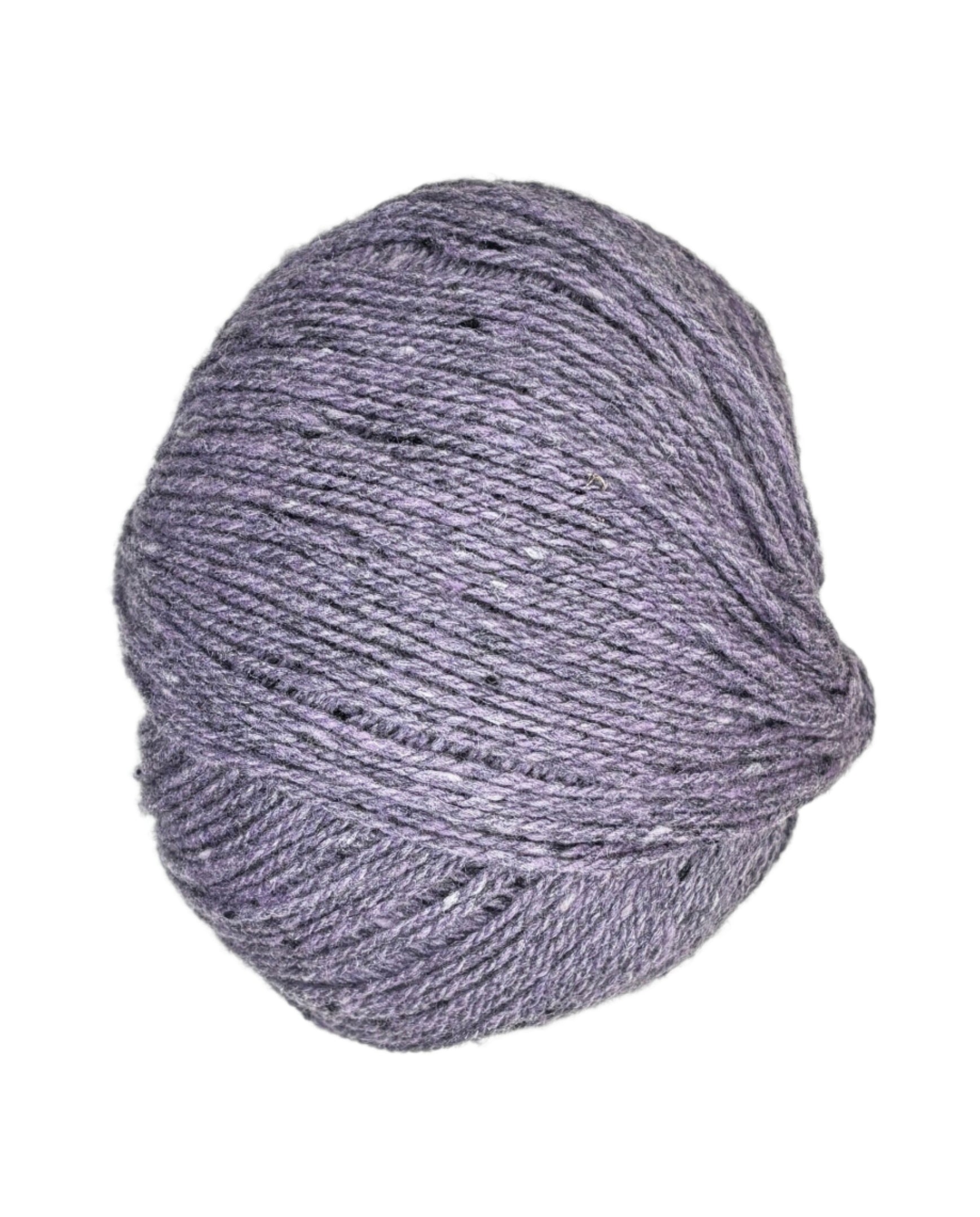 Ball of Kathmandu wool yarn in the color dusty purple