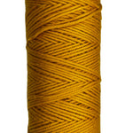 Amber yellow skein of cotton yarn
