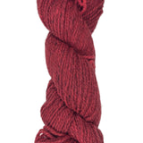Red skein of wool yarn on a white background