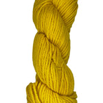 Yellow skein of wool yarn on a white background