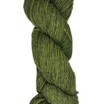 Green skein of wool yarn on a white background