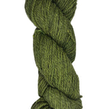 Green skein of wool yarn on a white background