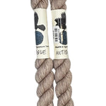 Two mini skeins of wool yarn hand dyed in Wyoming in the color off-white